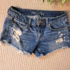 American Eagle blue jean distressed shorts